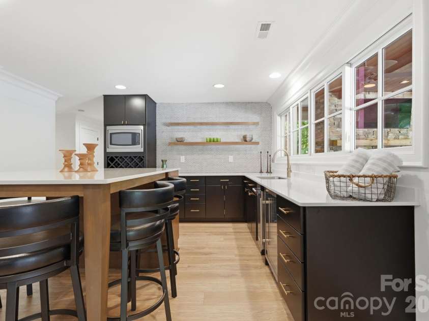 235 Grey Road, Davidson, NC 28036.  MLS# CAR4382846, YatesRealty ID 23048. Lower level kitchen