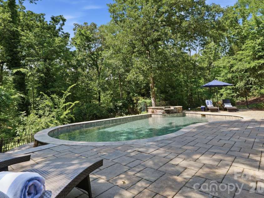 235 Grey Road, Davidson, NC 28036.  MLS# CAR4382846, YatesRealty ID 23048. Salt-water pool and total privacy!