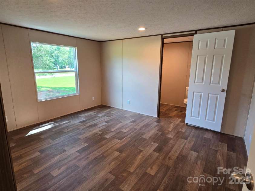 106 Burrus Road, Mooresboro, NC 28114.  MLS# CAR4276219, YatesRealty ID 23049. 