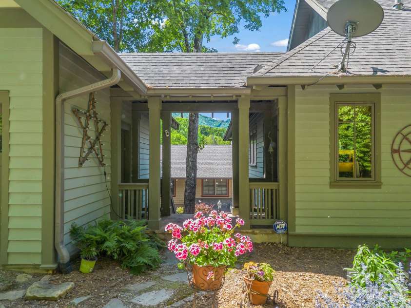 5 Longfellow Drive, Black Mountain, NC 28711.  MLS# CAR4380813, YatesRealty ID 23051. Breezeway Between House and Garage