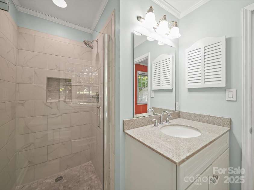 2104 Stoneyridge Drive, Charlotte, NC 28214.  MLS# CAR4275022, YatesRealty ID 23053. Primary Bathroom