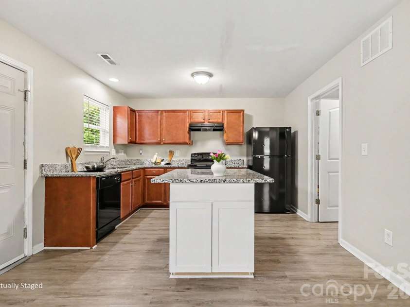 6532 Pennacook Drive, Charlotte, NC 28214.  MLS# CAR4382292, YatesRealty ID 23059. Virtually Staged