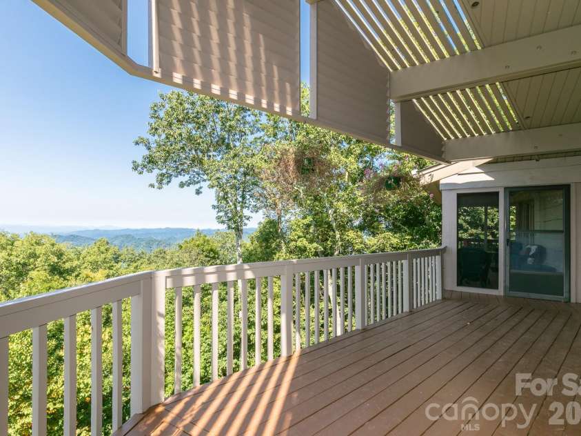 218 Slickrock Road, Burnsville, NC 28714.  MLS# CAR4377114, YatesRealty ID 23061. MAIN LEVEL AWNING