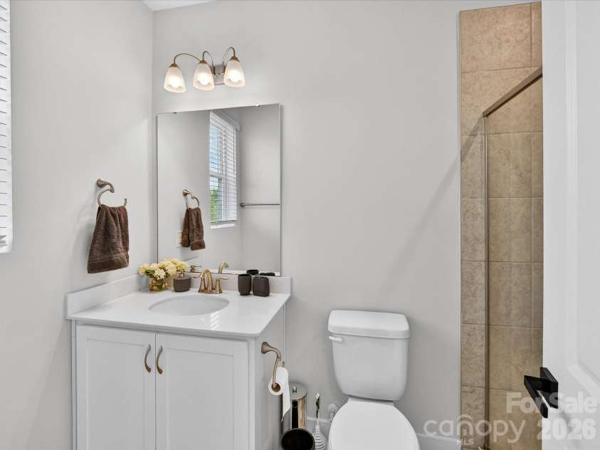 2744 Ensemble Court, Charlotte, NC 28262.  MLS# CAR4362848, YatesRealty ID 23067. Main floor bathroom