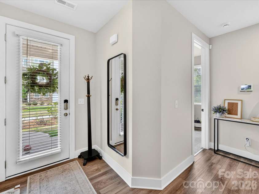 2744 Ensemble Court, Charlotte, NC 28262.  MLS# CAR4362848, YatesRealty ID 23067. Main floor entry