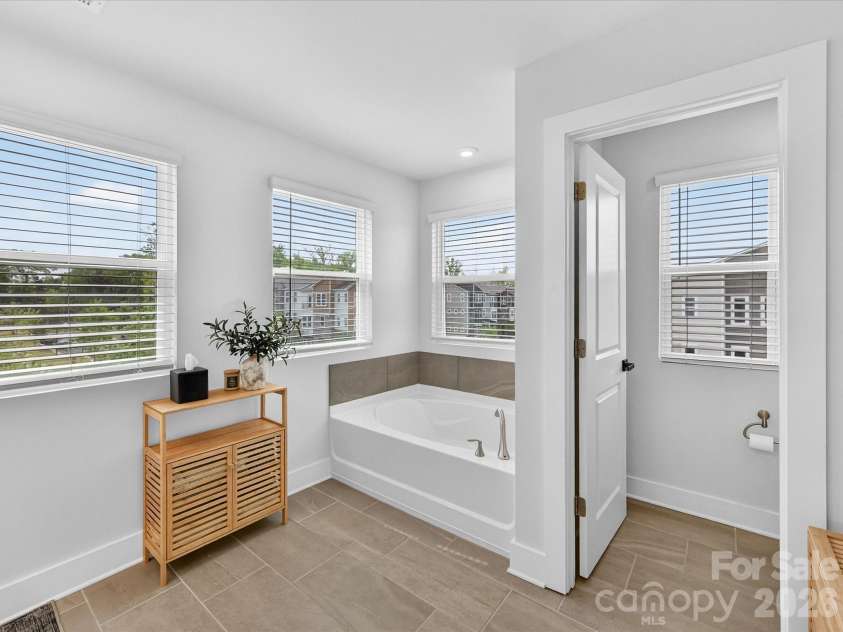 2744 Ensemble Court, Charlotte, NC 28262.  MLS# CAR4362848, YatesRealty ID 23067. Master bath