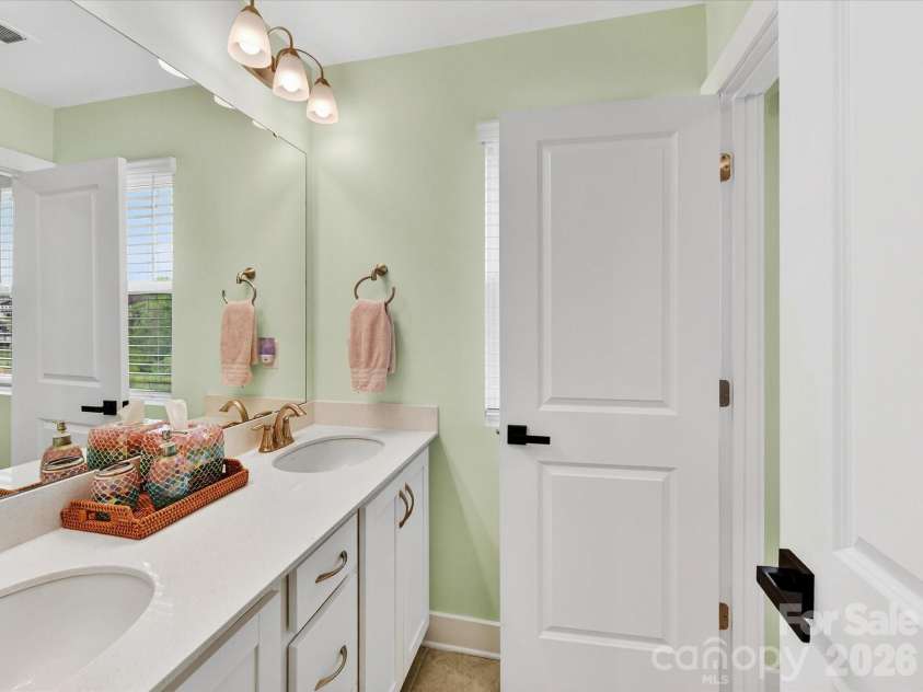 2744 Ensemble Court, Charlotte, NC 28262.  MLS# CAR4362848, YatesRealty ID 23067. Third floor guest bath