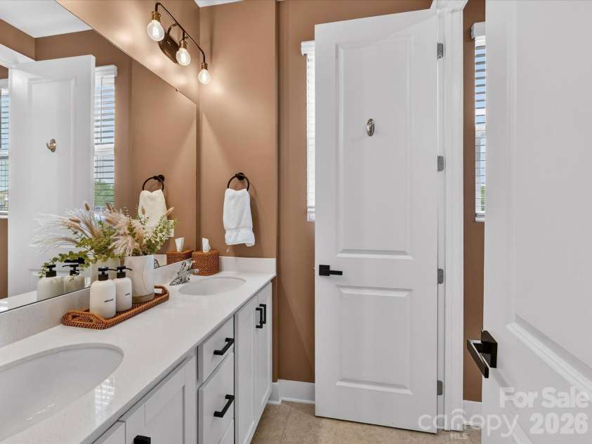 2744 Ensemble Court, Charlotte, NC 28262.  MLS# CAR4362848, YatesRealty ID 23067. Upper floor bath