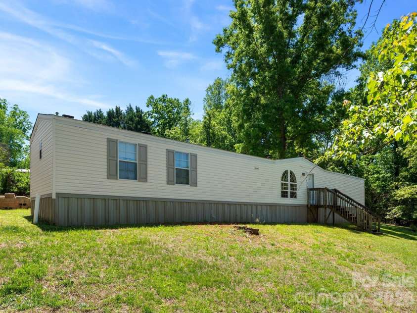 111 Otter Ridge Drive, Leicester, NC 28748.  MLS# CAR4378158, YatesRealty ID 23068. Back of Home