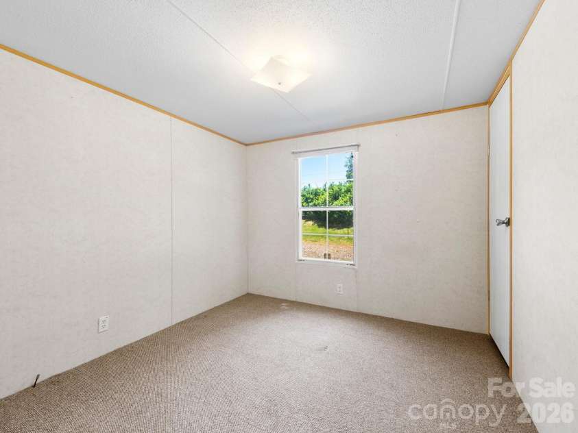 111 Otter Ridge Drive, Leicester, NC 28748.  MLS# CAR4378158, YatesRealty ID 23068. Bedroom