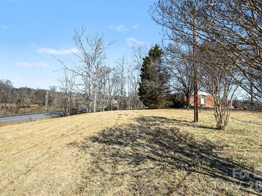 4650 Windy Road, Concord, NC 28027.  MLS# CAR4347275, YatesRealty ID 2307. Exterior facing brick house