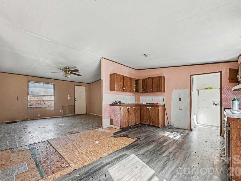 4650 Windy Road, Concord, NC 28027.  MLS# CAR4347275, YatesRealty ID 2307. Kitchen/living room