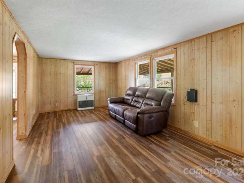 461 Tweed Road, Madison, NC 28753.  MLS# CAR4267871, YatesRealty ID 23071. Family Room