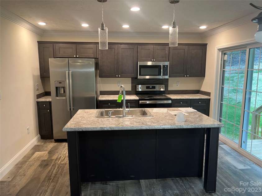 5716 Dalmatian Street, Iron Station, NC 28080.  MLS# CAR4024125, YatesRealty ID 23076. Kitchen