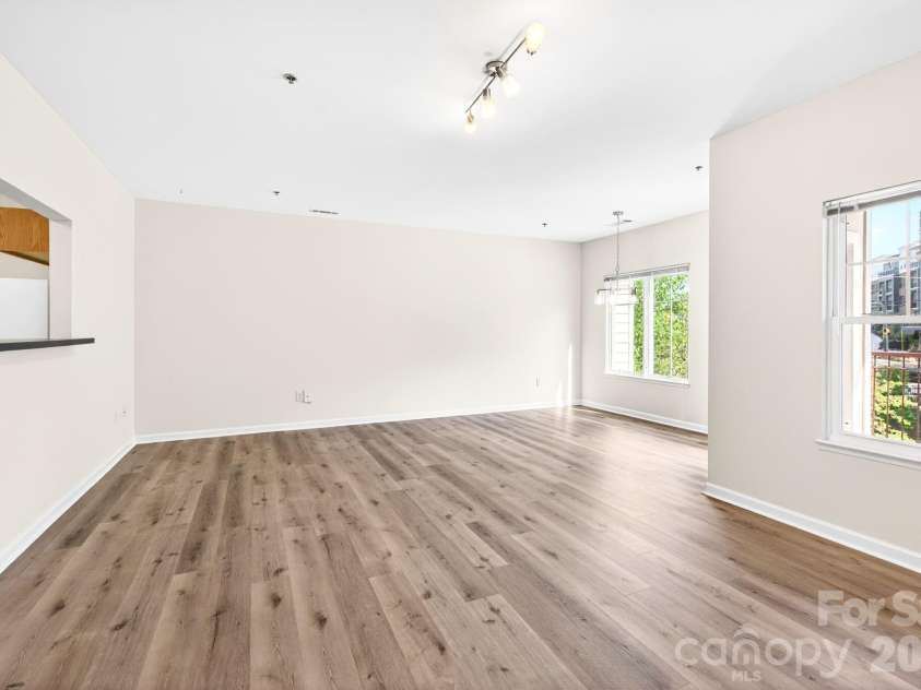 64 Clingman Avenue, Asheville, NC 28801.  MLS# CAR4371105, YatesRealty ID 23076. Light-filled open floor plan