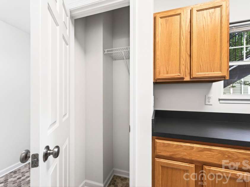 64 Clingman Avenue, Asheville, NC 28801.  MLS# CAR4371105, YatesRealty ID 23076. Pantry/closet for additional storage.