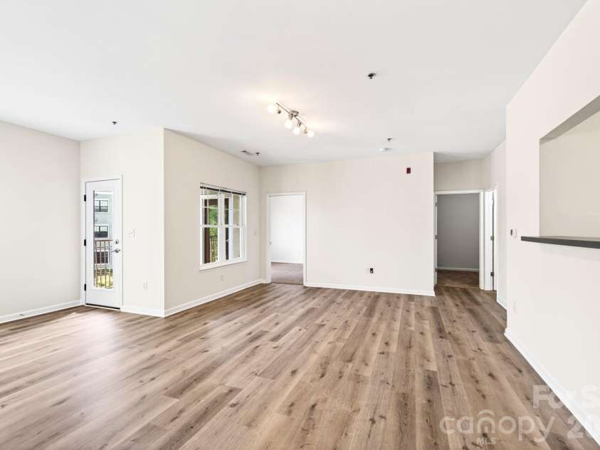 64 Clingman Avenue, Asheville, NC 28801.  MLS# CAR4371105, YatesRealty ID 23076. Vinyl plank flooring