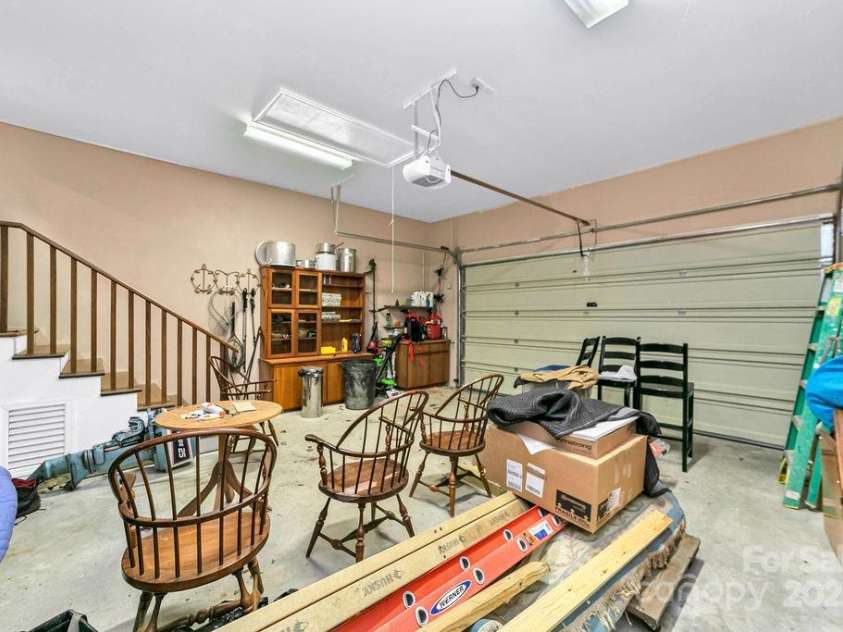499 Unvdatlvi Court, Brevard, NC 28712.  MLS# CAR4234754, YatesRealty ID 2308. 2 car Garage in Basement