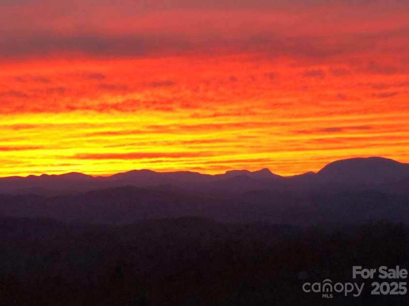 499 Unvdatlvi Court, Brevard, NC 28712.  MLS# CAR4234754, YatesRealty ID 2308. Another Sunset