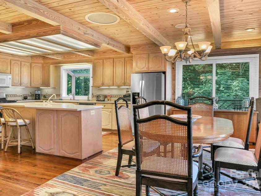 499 Unvdatlvi Court, Brevard, NC 28712.  MLS# CAR4234754, YatesRealty ID 2308. Dining to Kitchen