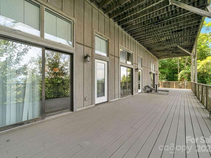 499 Unvdatlvi Court, Brevard, NC 28712.  MLS# CAR4234754, YatesRealty ID 2308. Lower Deck