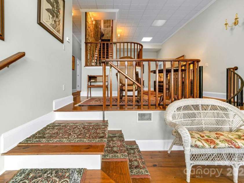 499 Unvdatlvi Court, Brevard, NC 28712.  MLS# CAR4234754, YatesRealty ID 2308. Stairs to Basement