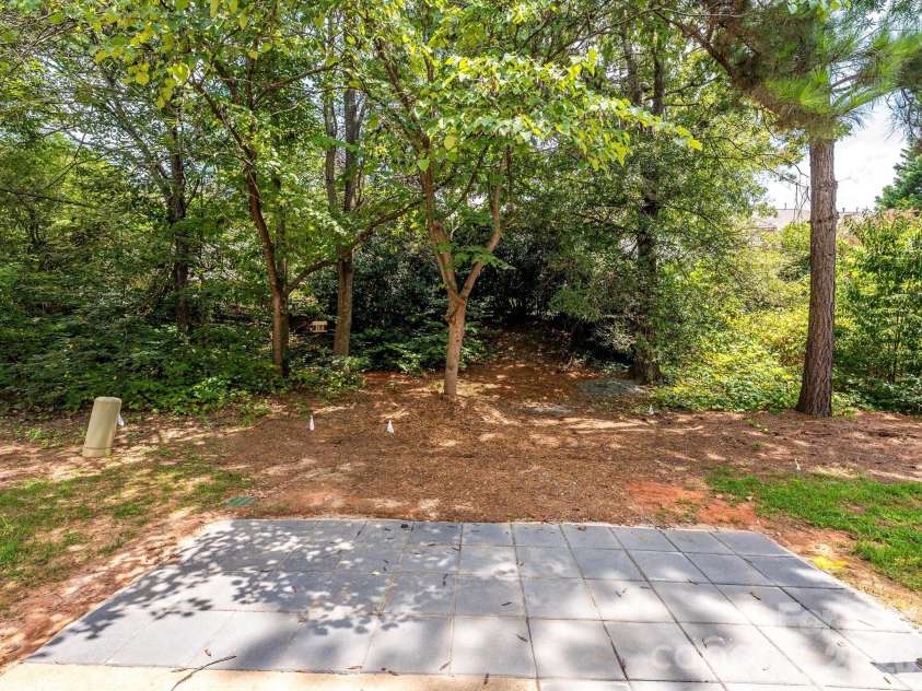 15583 Stronvar House Lane, Charlotte, NC 28277.  MLS# CAR4415520, YatesRealty ID 23080. Private Wooded Back Yard