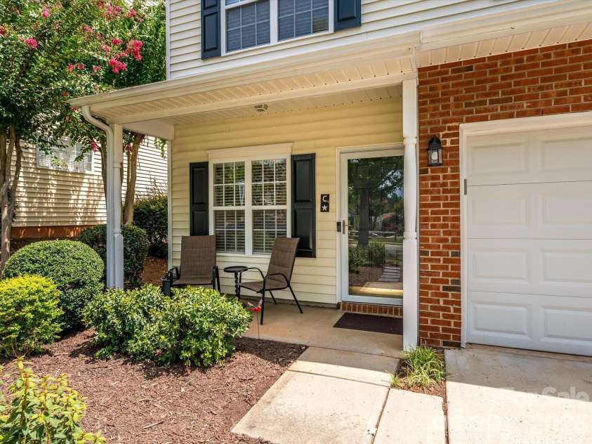 15583 Stronvar House Lane, Charlotte, NC 28277.  MLS# CAR4415520, YatesRealty ID 23080. Rocking Chair Front Porch