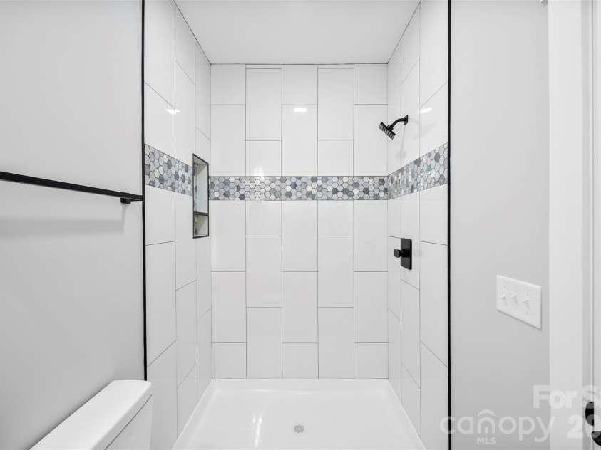 392 Park Road, Albemarle, NC 28001.  MLS# CAR4376170, YatesRealty ID 23081. Custom Tile Shower