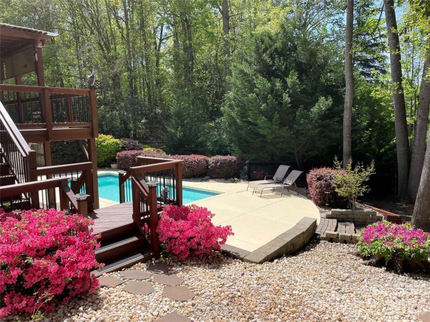 106 Shade Tree Circle, Fort Mill, SC 29715.  MLS# CAR4353903, YatesRealty ID 23082. Spring blooms in back yard