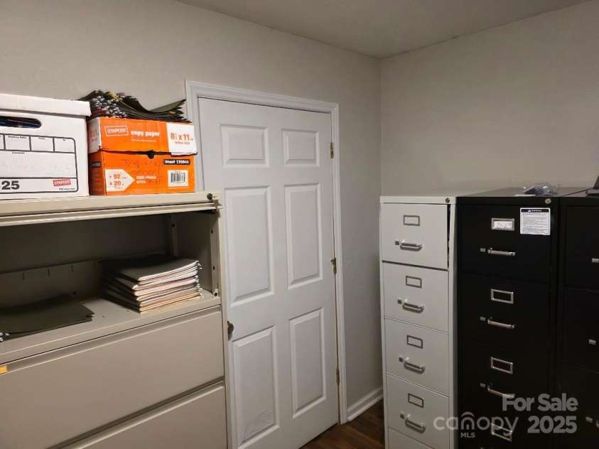 14 Yellow Brick Lane, Burnsville, NC 28714.  MLS# CAR4273450, YatesRealty ID 23082. Closet in corner of primary bedroom