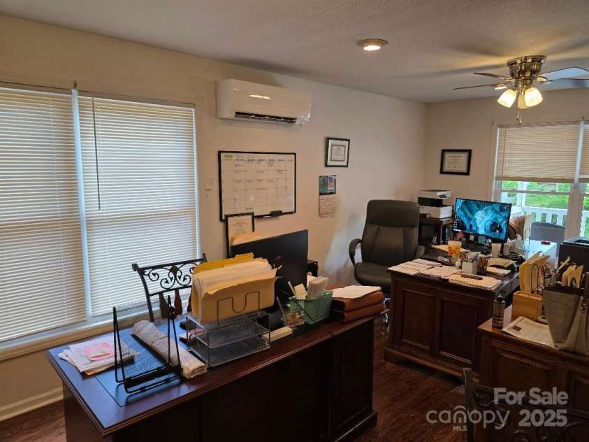 14 Yellow Brick Lane, Burnsville, NC 28714.  MLS# CAR4273450, YatesRealty ID 23082. Front corner of great room/living room