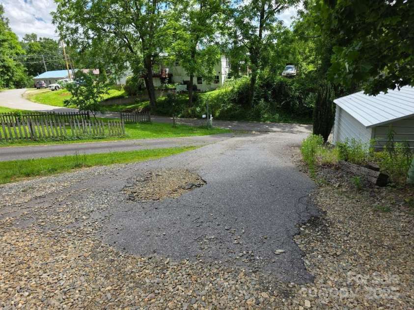 14 Yellow Brick Lane, Burnsville, NC 28714.  MLS# CAR4273450, YatesRealty ID 23082. Looking down Yellow Brick Lane to the intersection with Reid Street