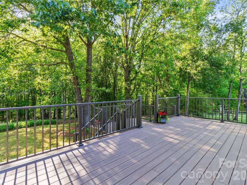 702 Addie Drive, Iron Station, NC 28080.  MLS# CAR4366126, YatesRealty ID 23085. Beautiful expanded deck