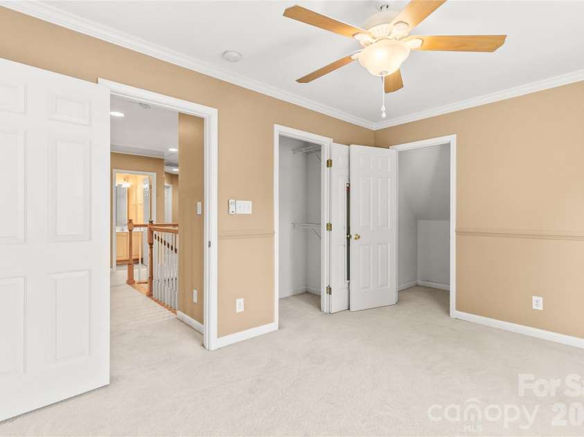 702 Addie Drive, Iron Station, NC 28080.  MLS# CAR4366126, YatesRealty ID 23085. Upstairs bedroom