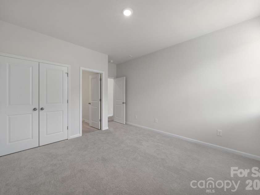 300 Kennerly Center Drive, Mooresville, NC 28115.  MLS# CAR4334795, YatesRealty ID 23089. Main Level Guest Suite