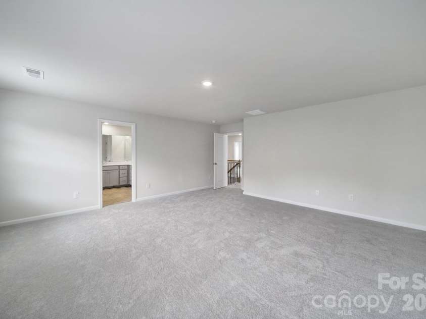 300 Kennerly Center Drive, Mooresville, NC 28115.  MLS# CAR4334795, YatesRealty ID 23089. Primary Bedroom