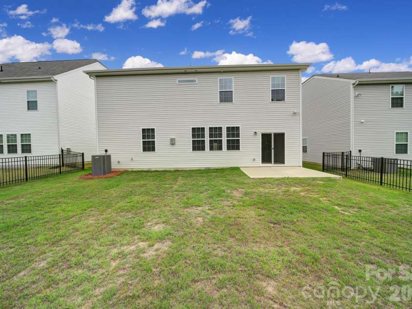 300 Kennerly Center Drive, Mooresville, NC 28115.  MLS# CAR4334795, YatesRealty ID 23089. Spacious Backyard