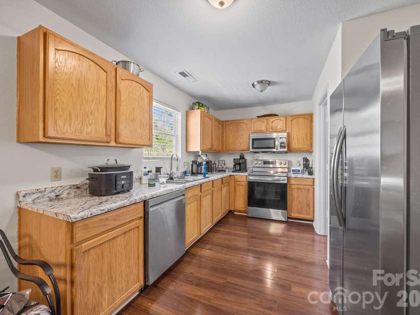 2621 Stream Bank Drive, Charlotte, NC 28269.  MLS# CAR4370879, YatesRealty ID 23090. 