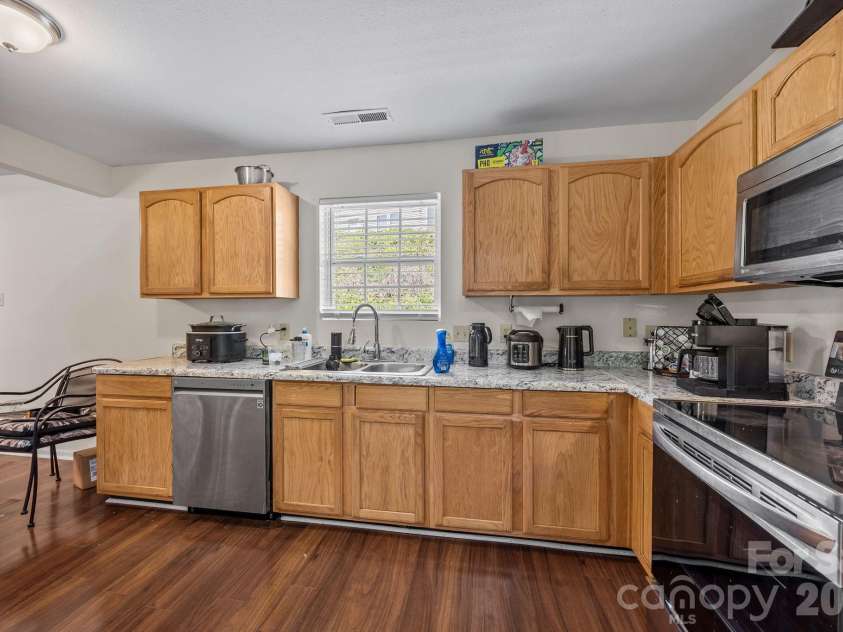 2621 Stream Bank Drive, Charlotte, NC 28269.  MLS# CAR4370879, YatesRealty ID 23090. 