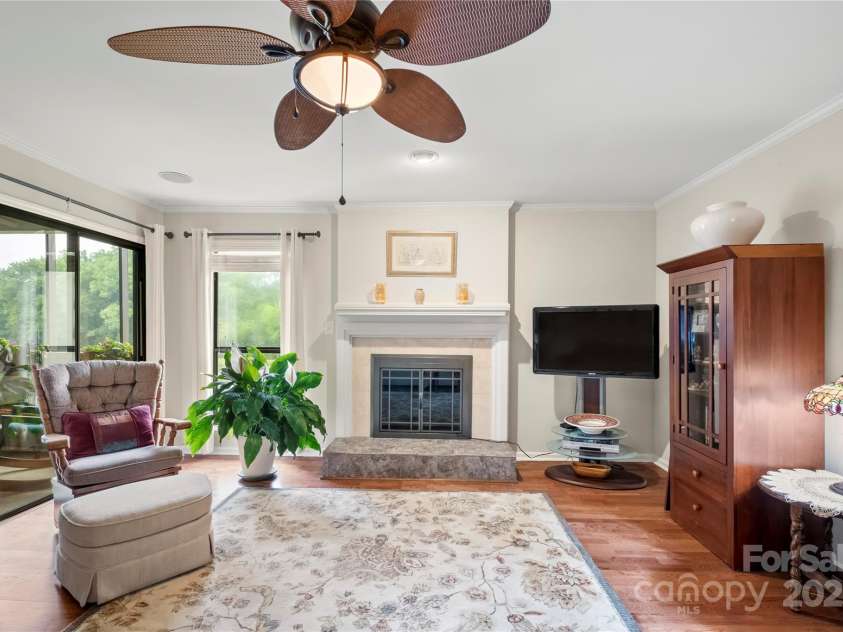 7329 Winery Lane, Charlotte, NC 28227.  MLS# CAR4265924, YatesRealty ID 23093. Fireplace with electric insert