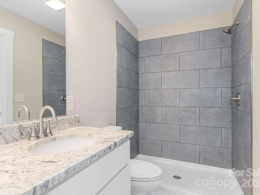 30 Wheeler Road, Weaverville, NC 28787.  MLS# CAR4191403, YatesRealty ID 231. Owner suite bathroom