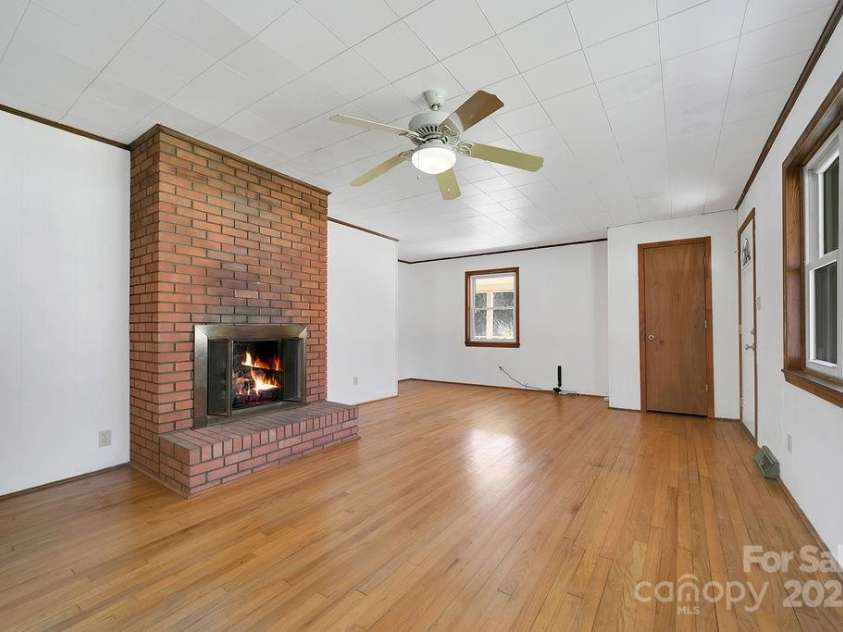1757 Rosman Highway, Brevard, NC 28712.  MLS# CAR4234818, YatesRealty ID 2310. Fireplace
