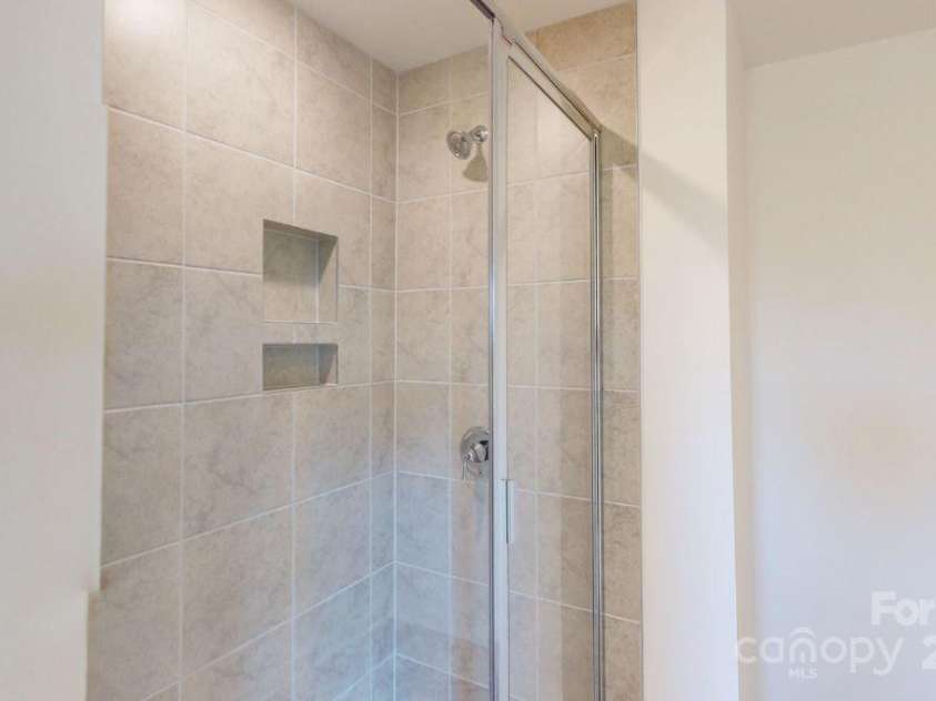 4061 Lawnview Drive, Charlotte, NC 28269.  MLS# CAR4169904, YatesRealty ID 23103. Owners bathroom