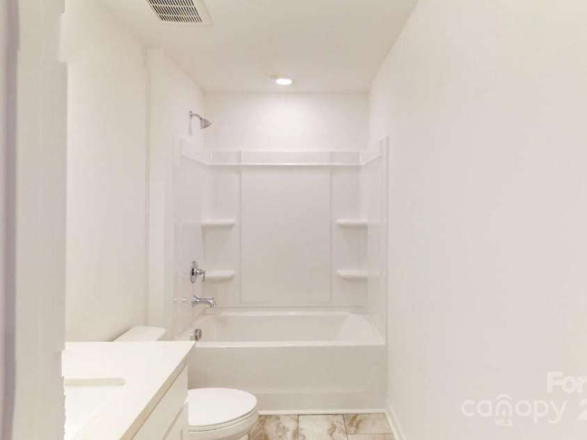 4061 Lawnview Drive, Charlotte, NC 28269.  MLS# CAR4169904, YatesRealty ID 23103. Secondary bathroom