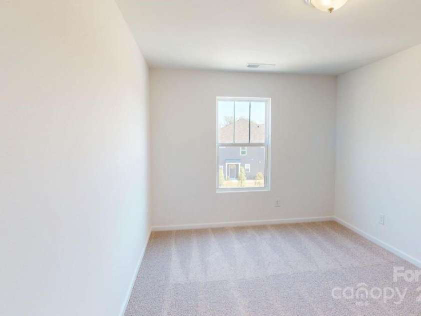 4061 Lawnview Drive, Charlotte, NC 28269.  MLS# CAR4169904, YatesRealty ID 23103. Secondary bedroom