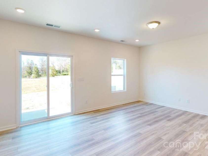 4057 Lawnview Drive, Charlotte, NC 28269.  MLS# CAR4188147, YatesRealty ID 23104. Family room