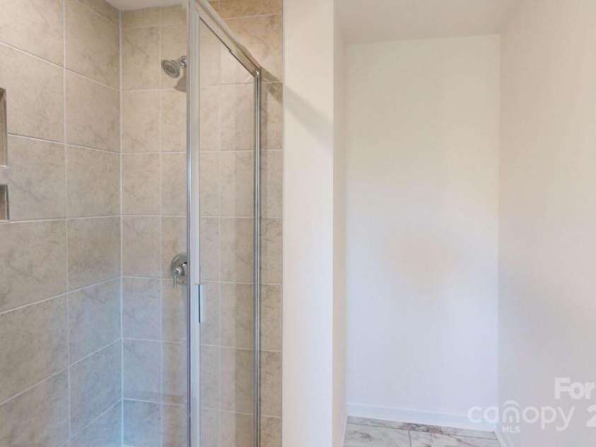 4057 Lawnview Drive, Charlotte, NC 28269.  MLS# CAR4188147, YatesRealty ID 23104. Owners bathroom