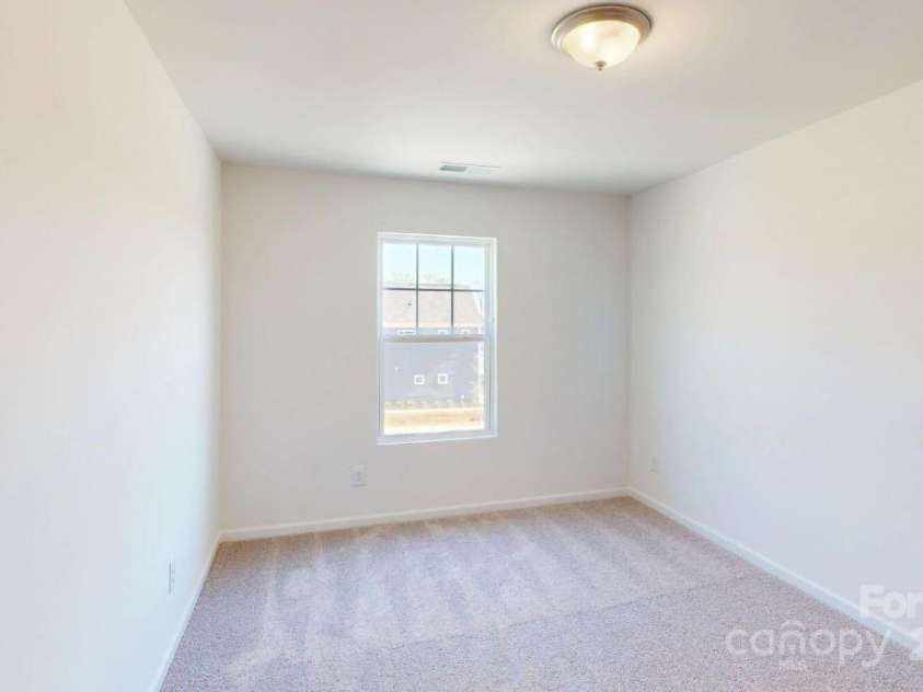 4057 Lawnview Drive, Charlotte, NC 28269.  MLS# CAR4188147, YatesRealty ID 23104. Secondary bedroom