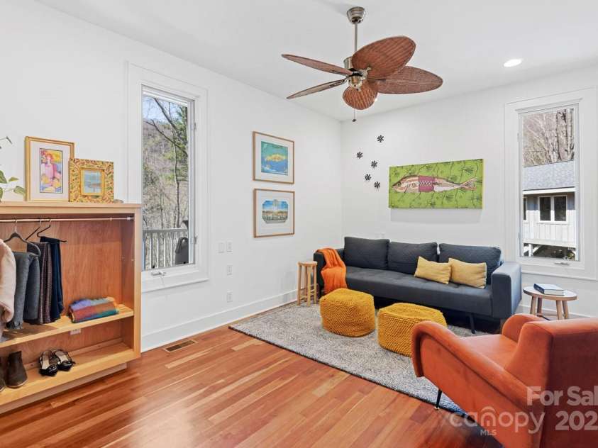425 Bull Creek Road, Asheville, NC 28805.  MLS# CAR4251410, YatesRealty ID 23105. Spacious private guest bedroom in guest wing with access to the sleeping porch.
